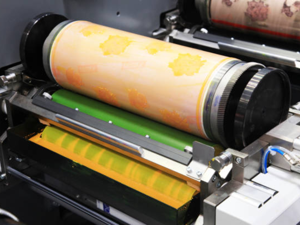 KETE Group Workers Operating High-Speed Machines